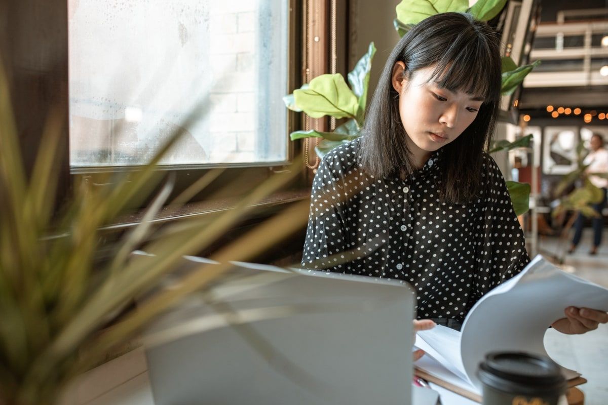 Remote worker reviewing employment contract