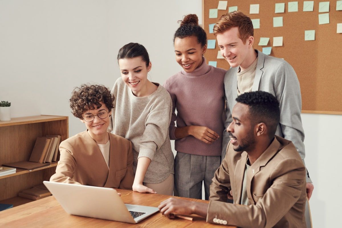 Office workers reviewing job applications