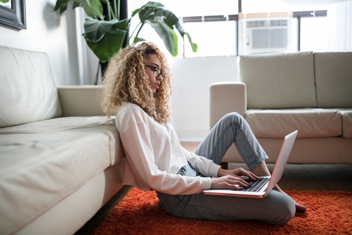 Woman at home researching