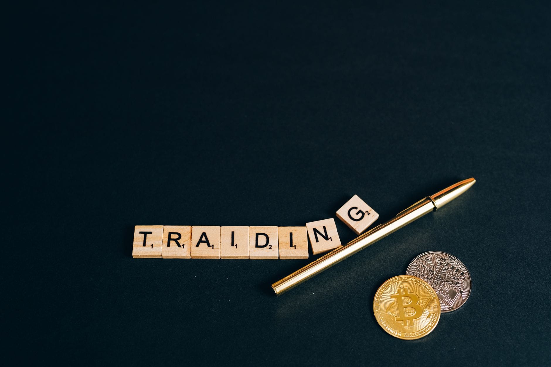 Cryptocurrency tokens stacked on financial charts representing staking and lending yields