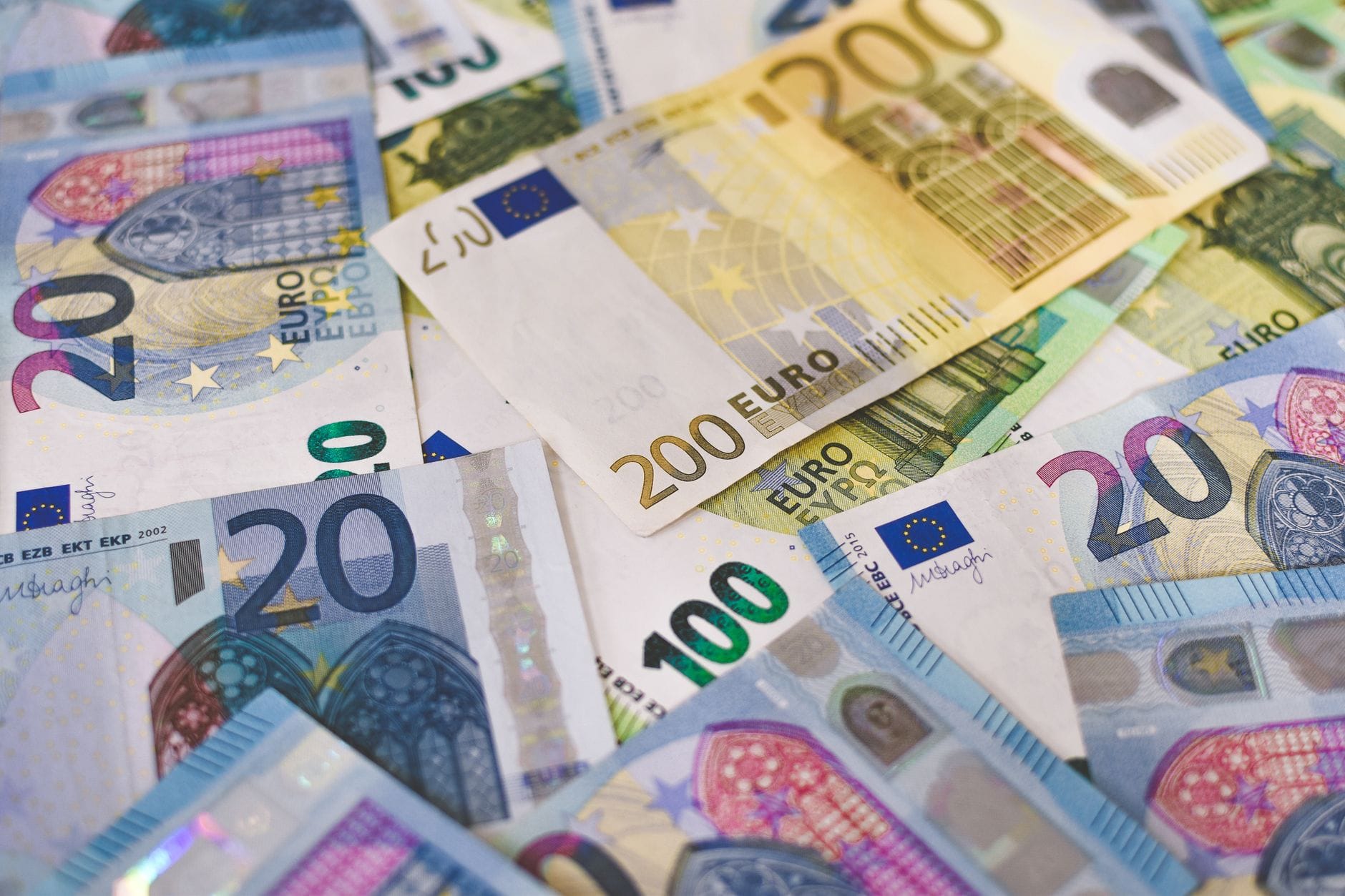 Euro currency notes and digital finance symbols representing stablecoin regulation