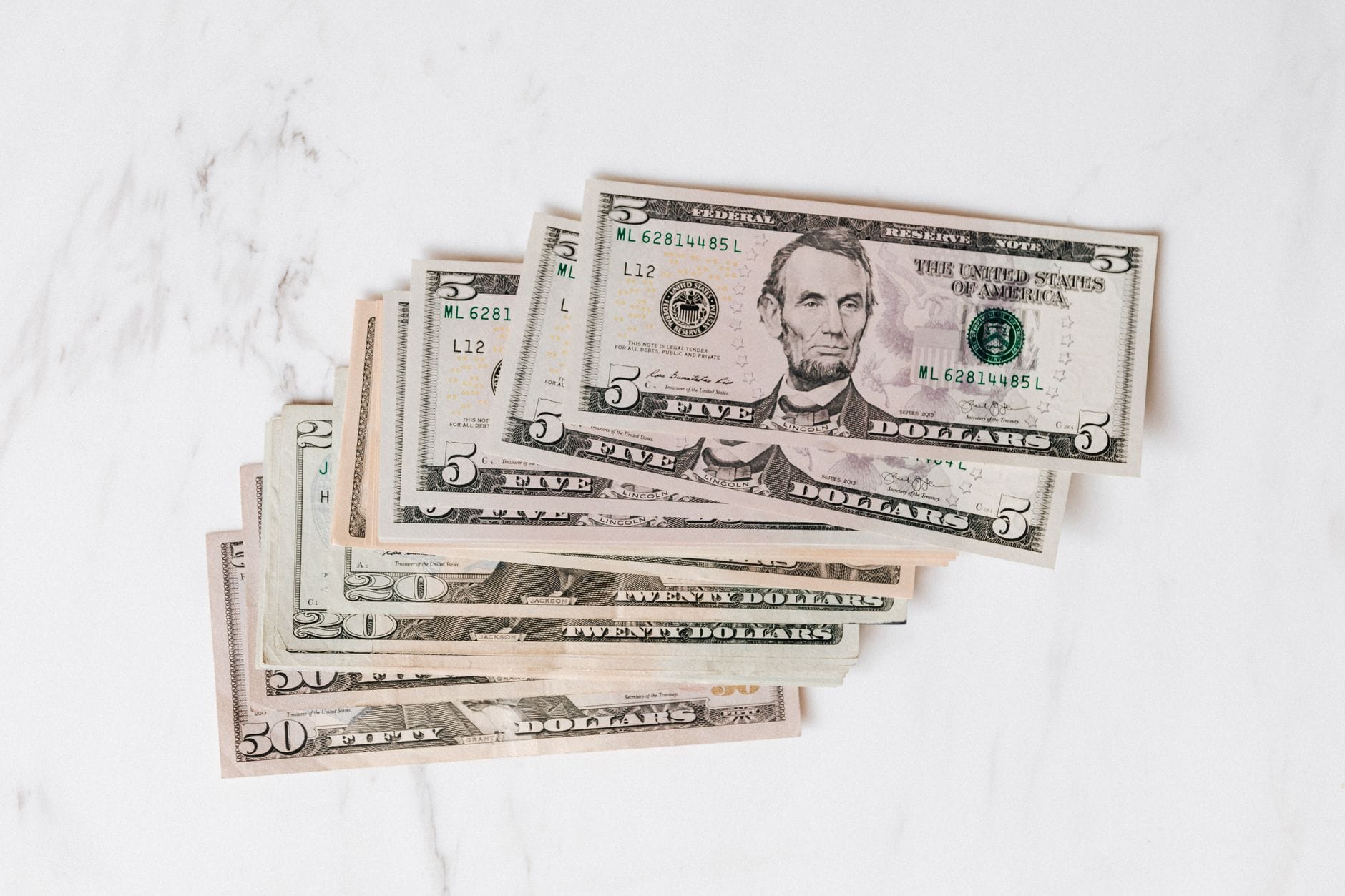 U.S. dollar bills representing stablecoin payment infrastructure and remittance networks