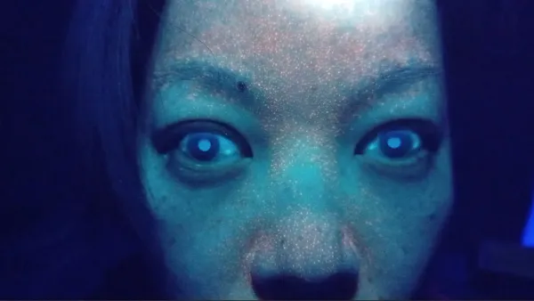 Fluorescent Glow In The Faces Of The Vaccinated Under UV Light