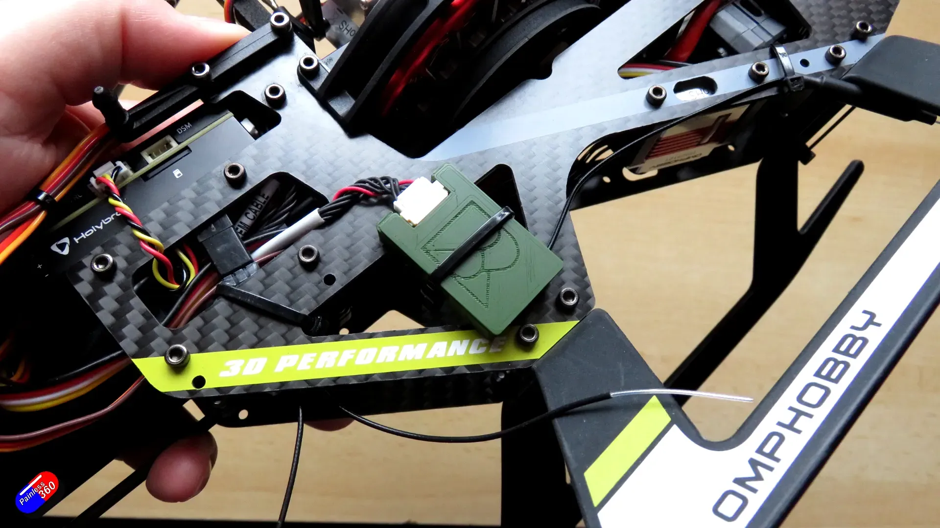 OMP Hobby M4 helicopter with Beyond Robotics Wi-Fi MavLink connection installed
