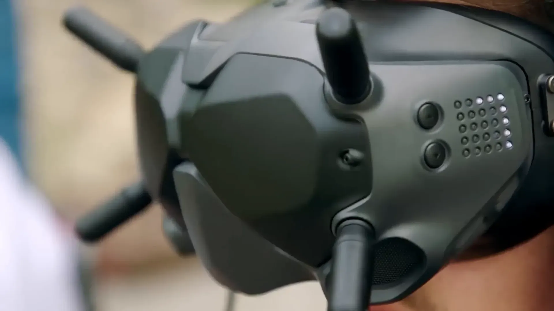 Handheld goggles and the DJI Avata displayed at product launch