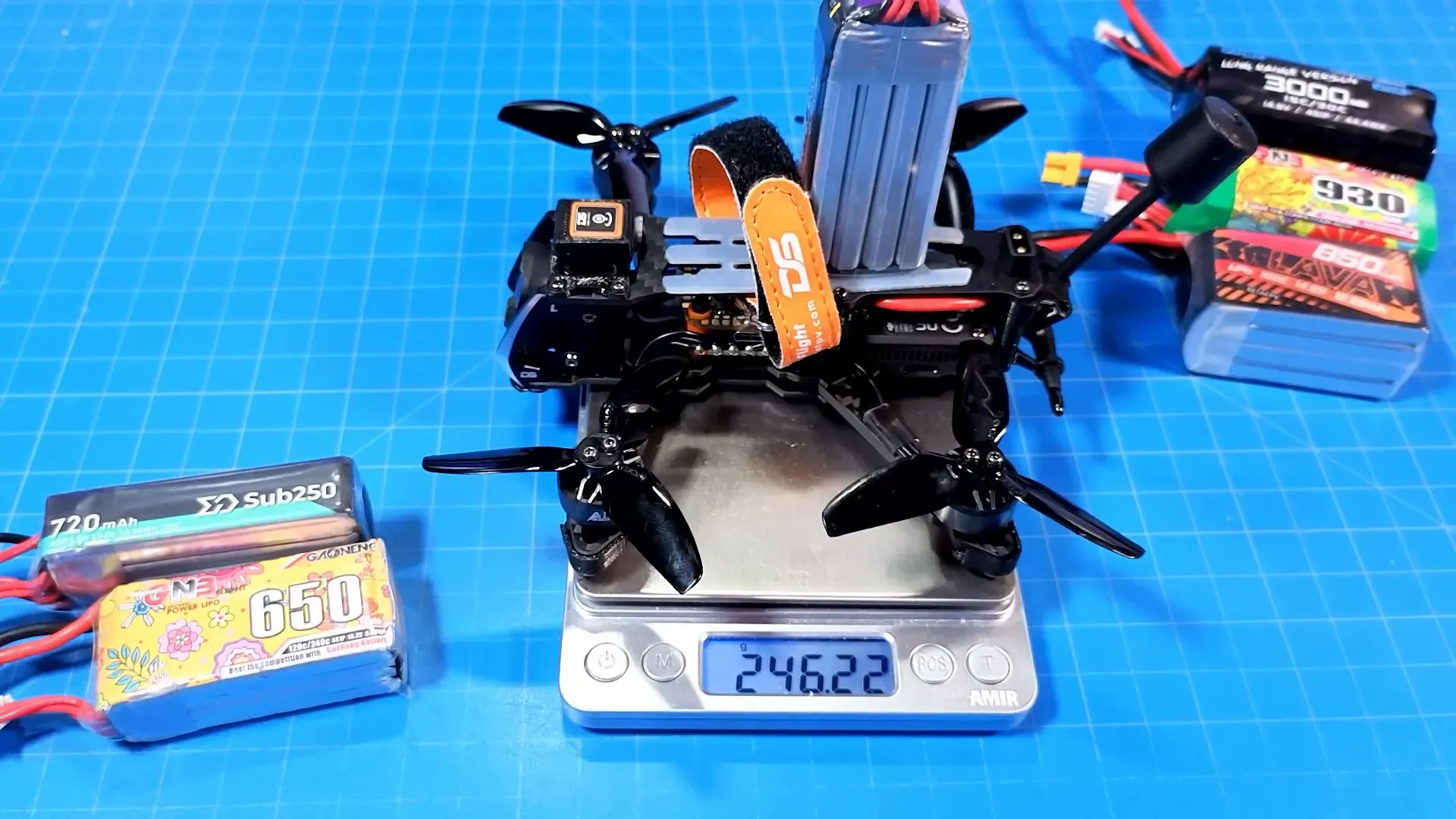 Scale showing Seeker3 weight under 250g with flat pack