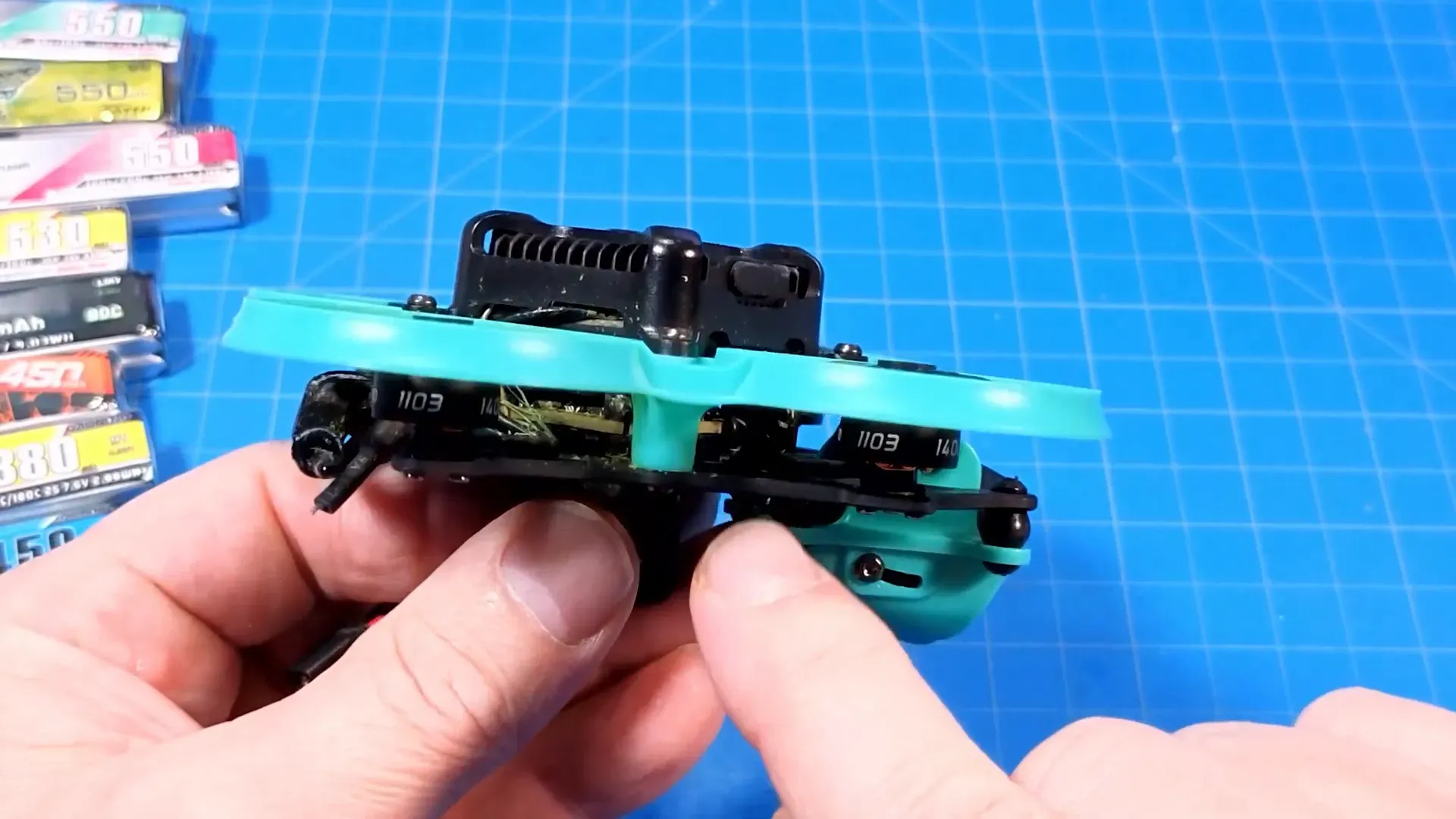 VTX and soldered motor pads visible under the frame