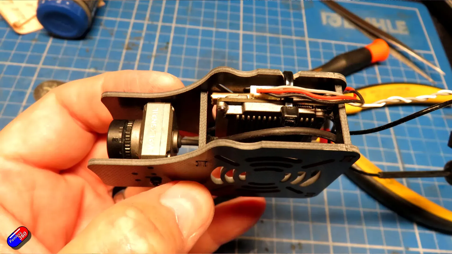 Walksnail HD unit with 3D printed shims and zip tie mount