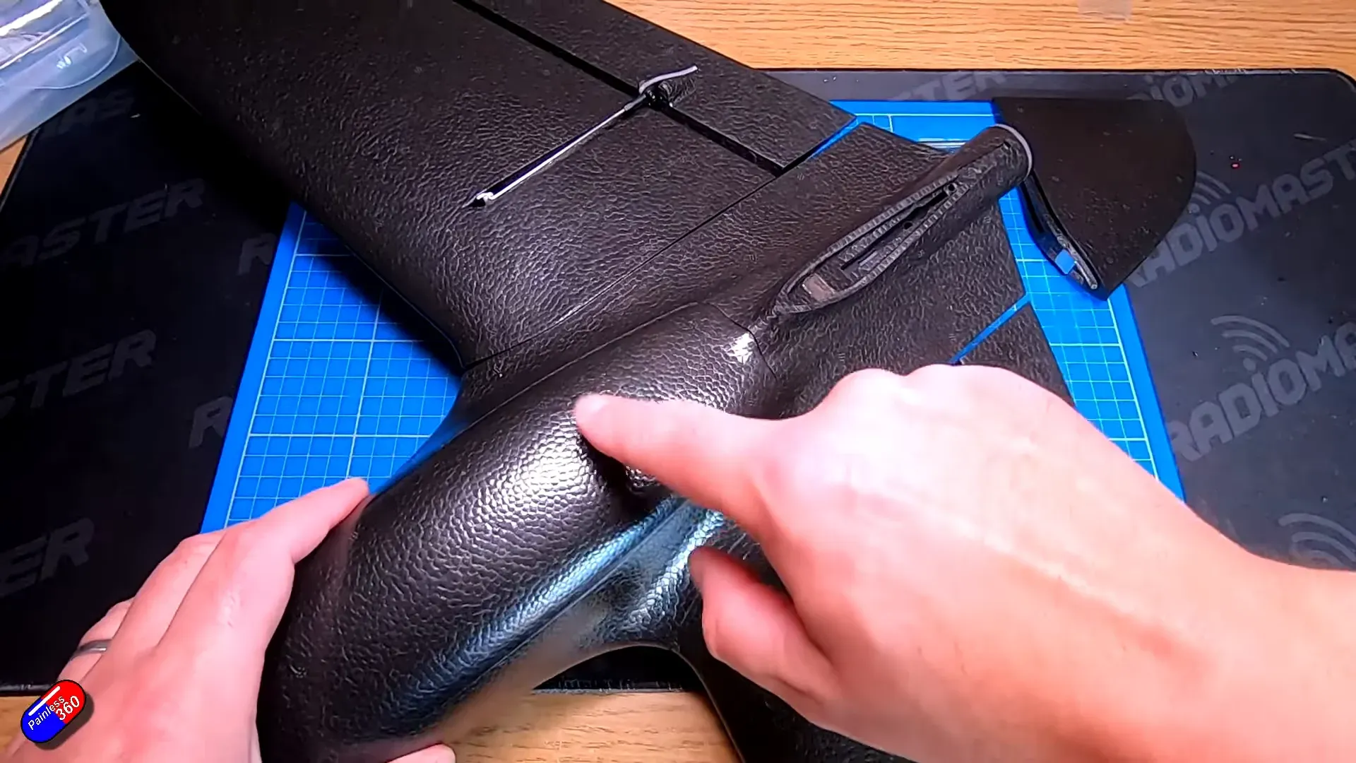 magnet recessed into tail for snap fit