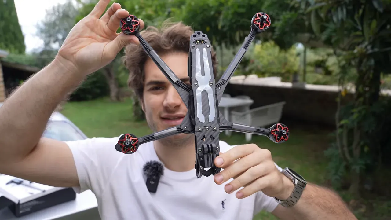 Dead-cut frame showing long rear arms and prop clearance