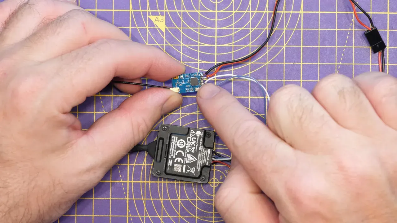 Close-up of TX/RX pads and BEC wiring