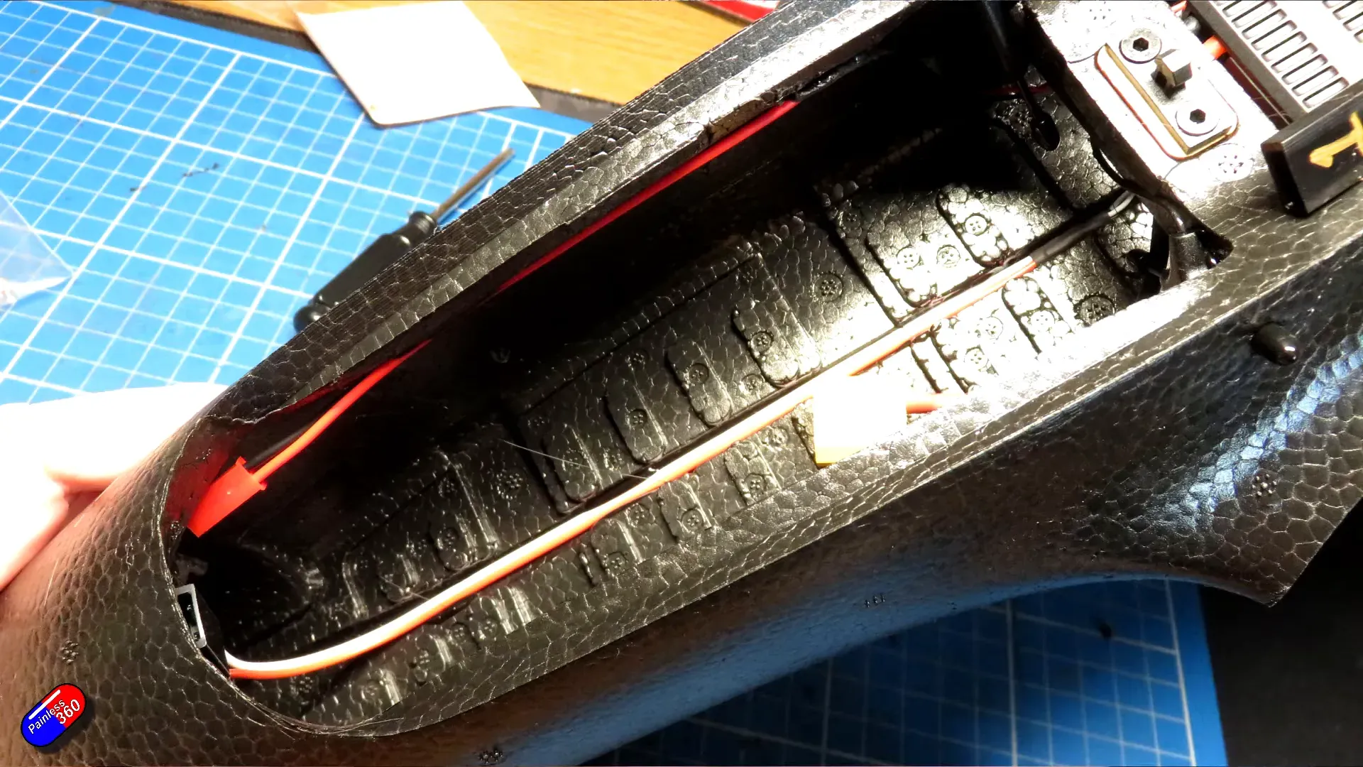 signal cable run under the board toward the Walksnail unit