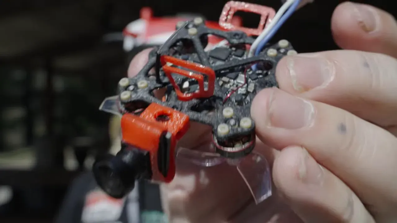 Final shot of the tiny drones with packaging and extra printed parts