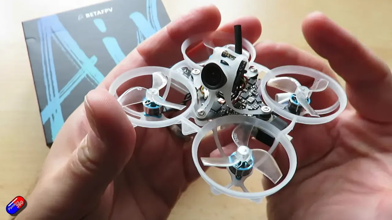 Painless360 holding the Air65 Wisp and the Light Radio 4 box