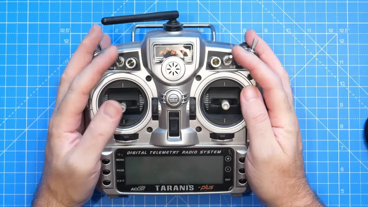 Top-down view of FrSky Taranis showing gimbals, switches and side potentiometers