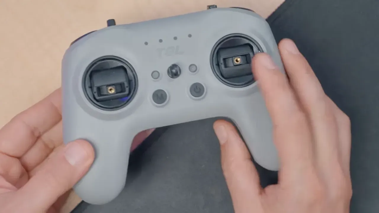 RadioMaster T8L front view showing joysticks, buttons and ergonomic grey shell