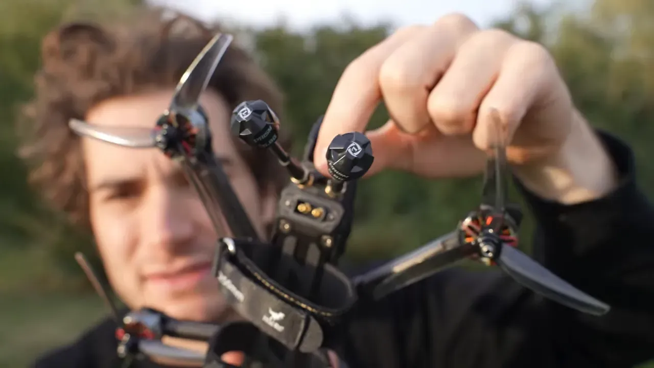 Close-up of the NBlade MAX rear showing two analog-style antenna mounts and the power connector