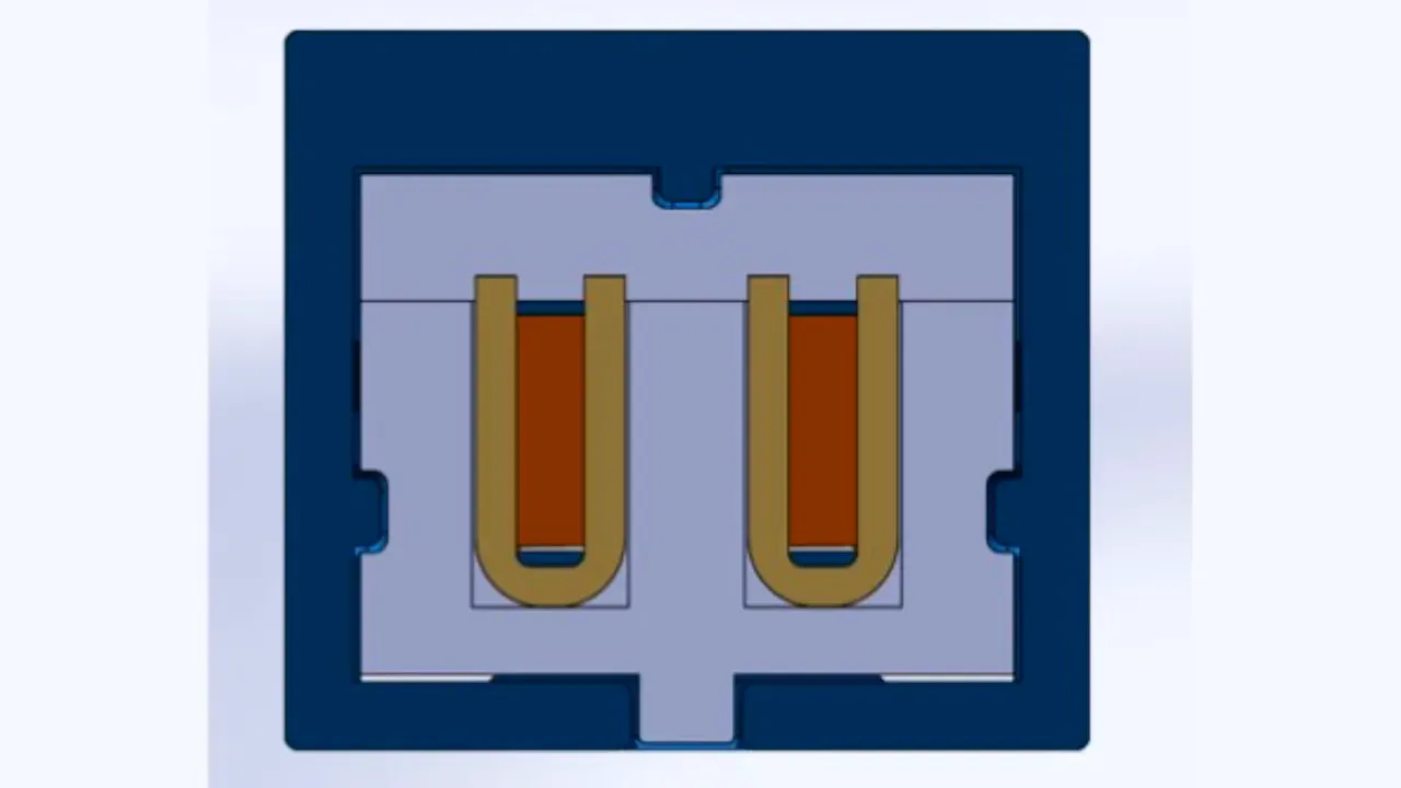 Cutaway diagram of the NX69 connector showing two U‑shaped brass battery‑side contacts and the internal drone‑side pin cavities