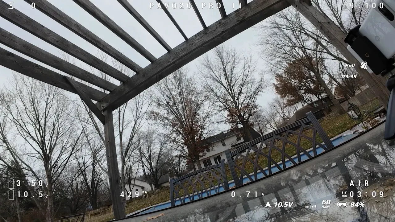 FPV onboard view showing Pavo20 Pro II telemetry at landing: flight time 03:09, total voltage 10.5V, per-cell ~3.50V