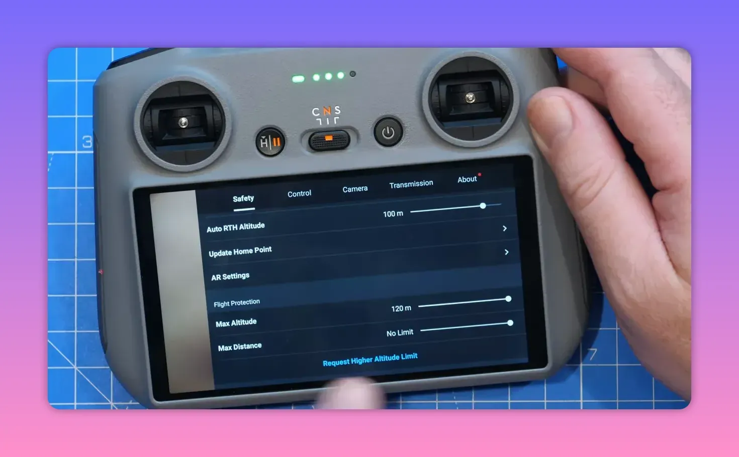 Close-up of DJI controller screen Safety tab showing Max Altitude 120 m and 'Request Higher Altitude Limit'