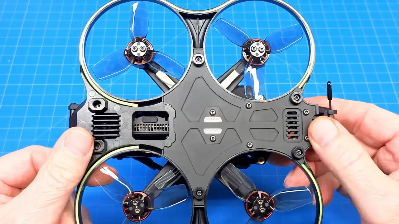 Cinebot25 V2 top plate close-up with removable cover, hex screws and access openings