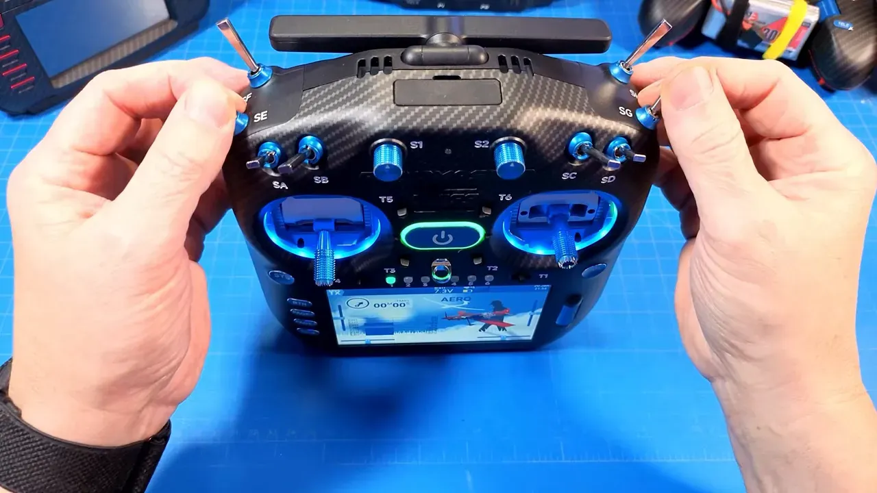 Close centered view of RadioMaster TX16S Mk3 Max showing switches, potentiometers and blue gimbals