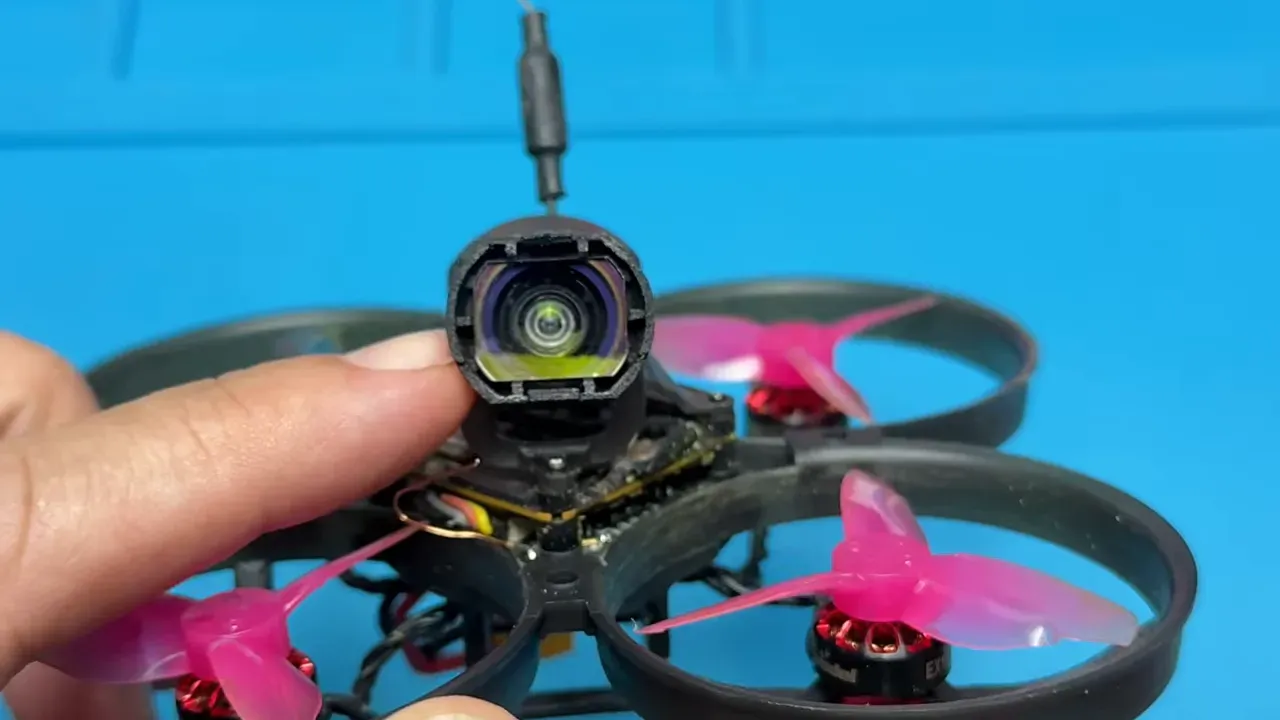 Mobula 804 cinewhoop with FOV extender installed showing centered camera lens and canopy