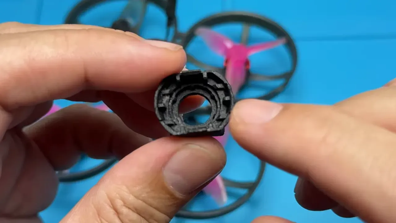 Close-up of Mobula 8 canopy pocket interior showing mounting grooves where the extender lens fits