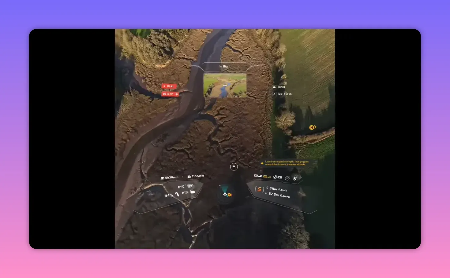 FPV goggles top-down view showing riverbed and inset preview window, telemetry and 'In flight' banner