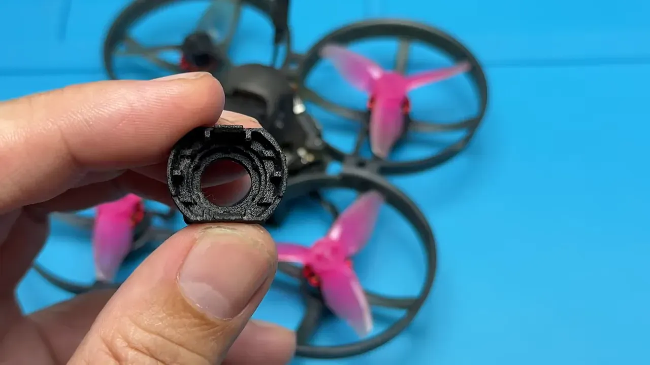 Clear front view of Mobula canopy pocket showing circular lens aperture and seating grooves