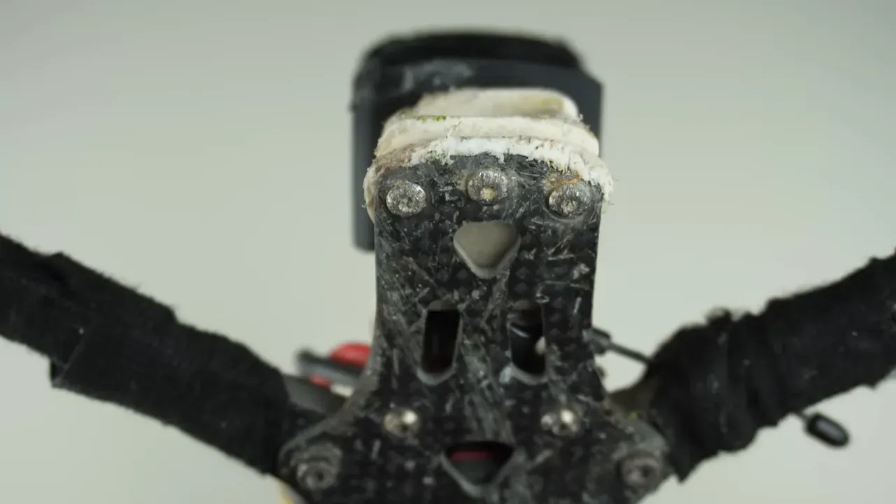 Clear motor close-up with nut and scratched paint