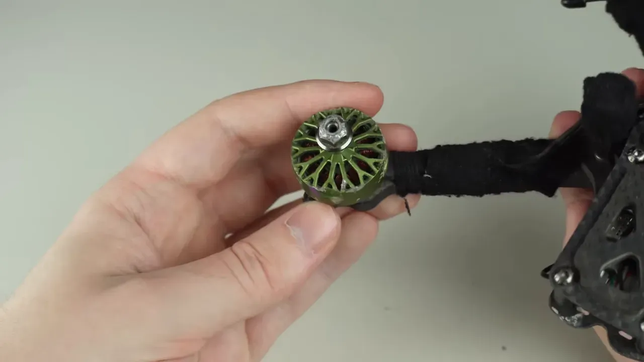 Top view of FPV motor showing nut and mounting area on arm