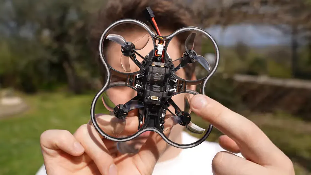 Oxbot Lumo18 front view with flight controller electronics and ESC area exposed outdoors