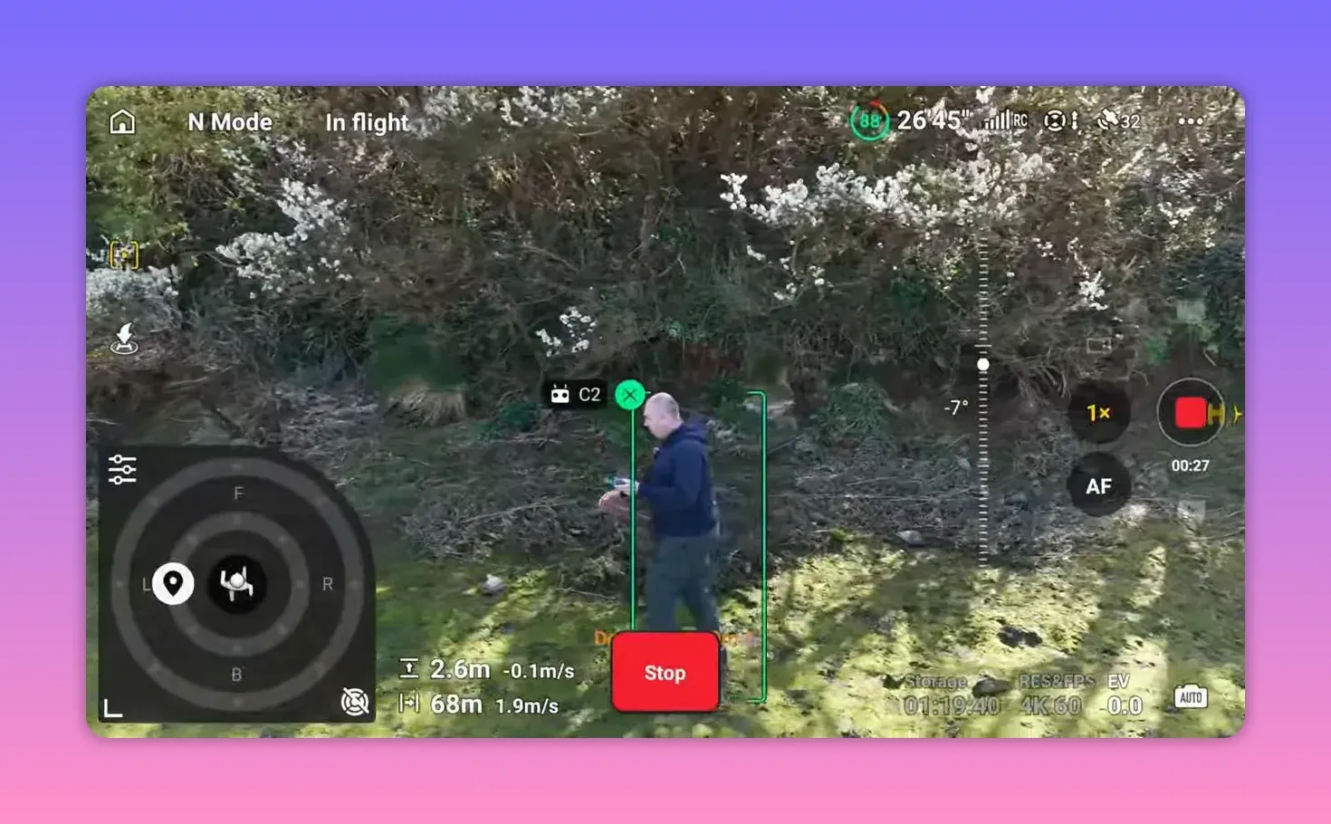 DJI RC2 controller live view in N mode showing obstacle sensing subject box and Stop action during close approach test