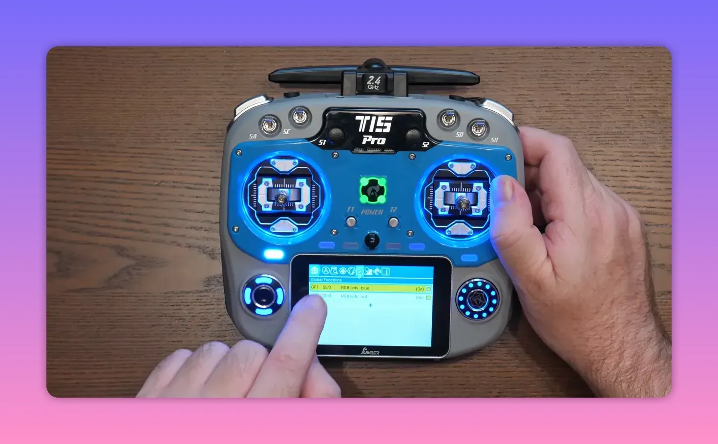 Jumper T15 Pro transmitter front view with RGB settings on touchscreen