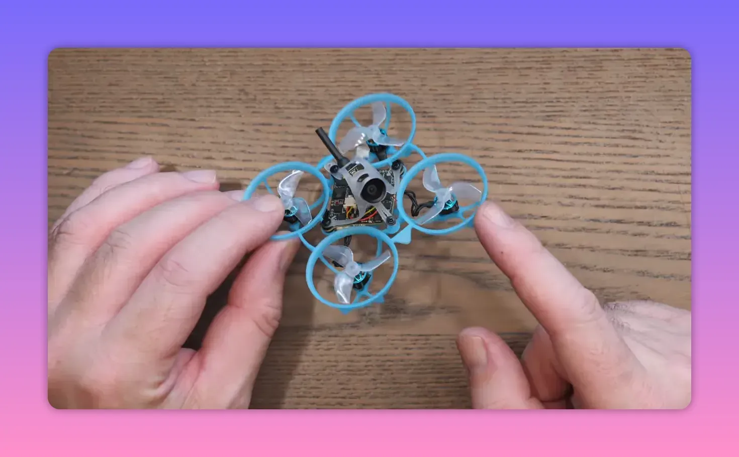 BetaFPV Air65 II freestyle whoop top view showing flight stack and camera hardware