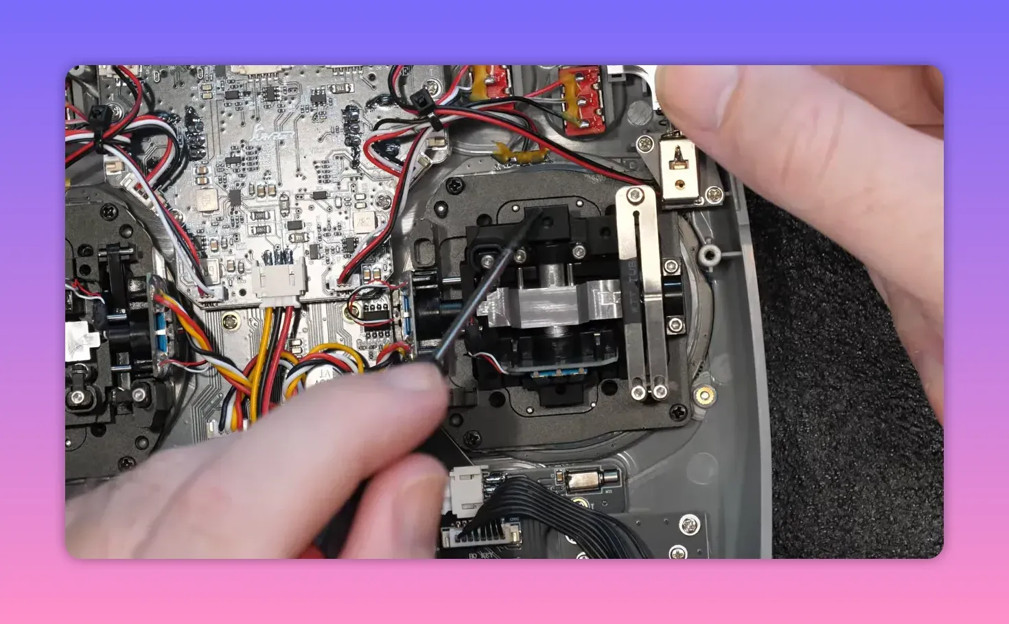 Jumper T15 Pro teardown close-up of gimbal-side assembly and routed wiring