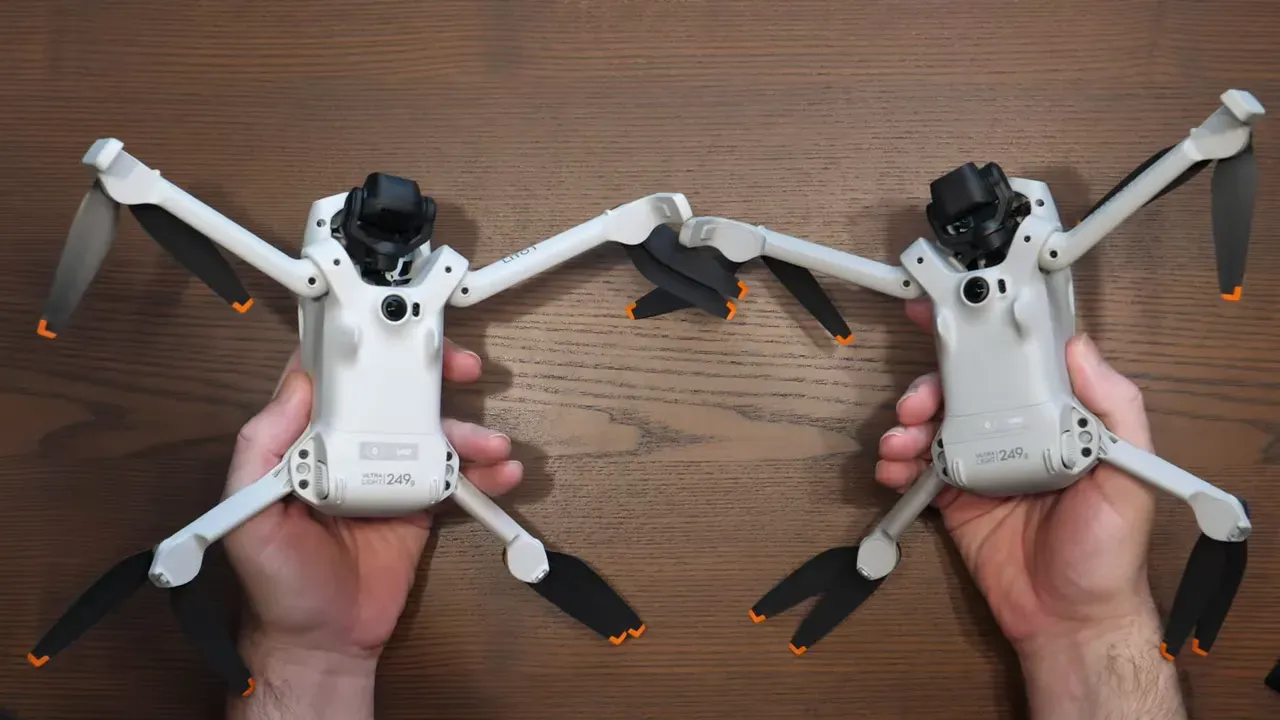 DJI Lito 1 and Lito X1 drones held in hands side-by-side with arms extended