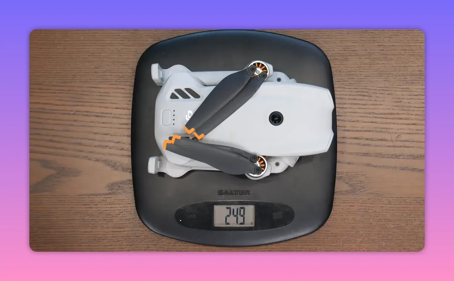 DJI Lito X1 drone resting on a scale showing a weight reading of about 248.5g