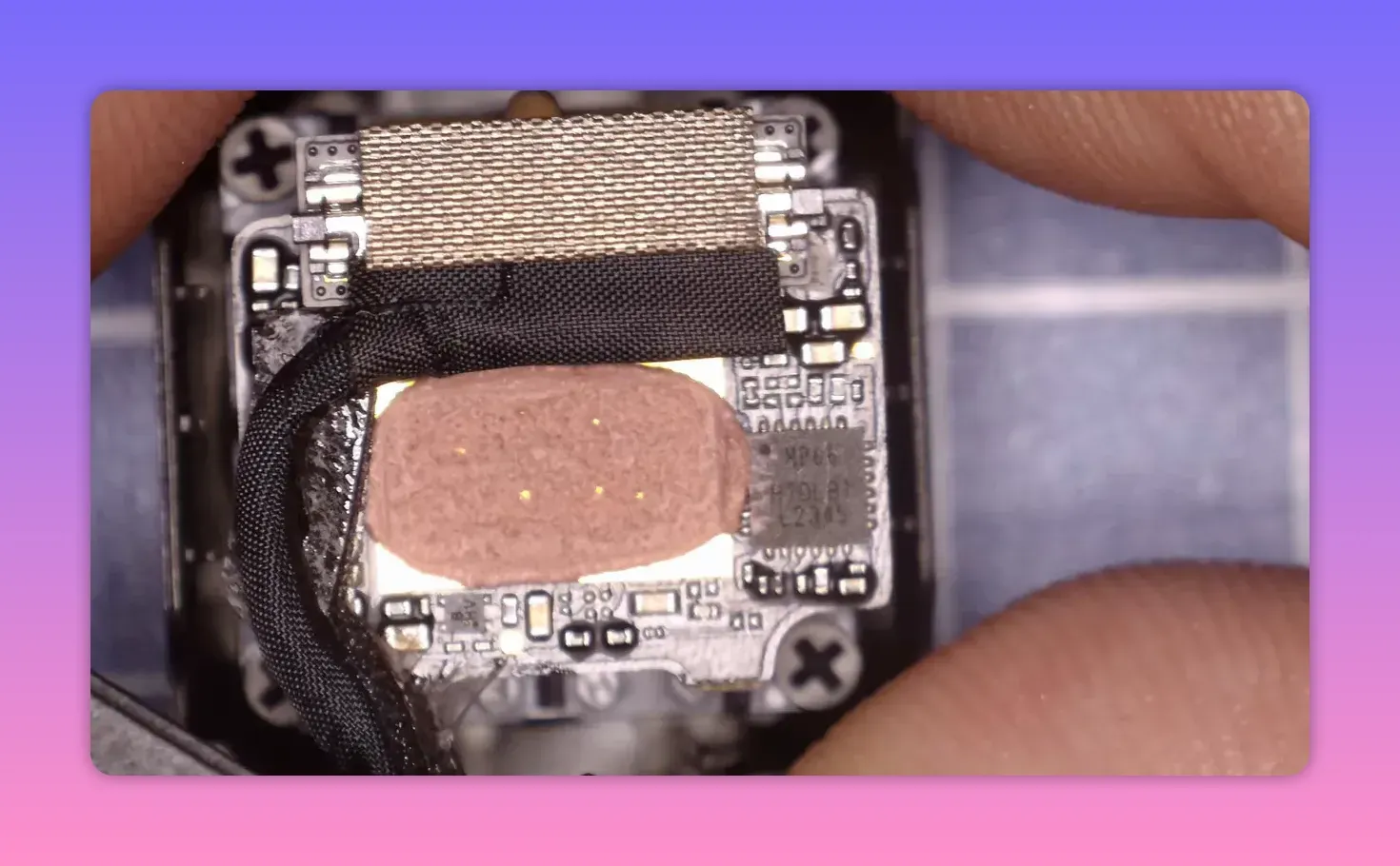 Wider close-up of the DJI O4 Pro camera PCB with the integrated gyro-related module and components