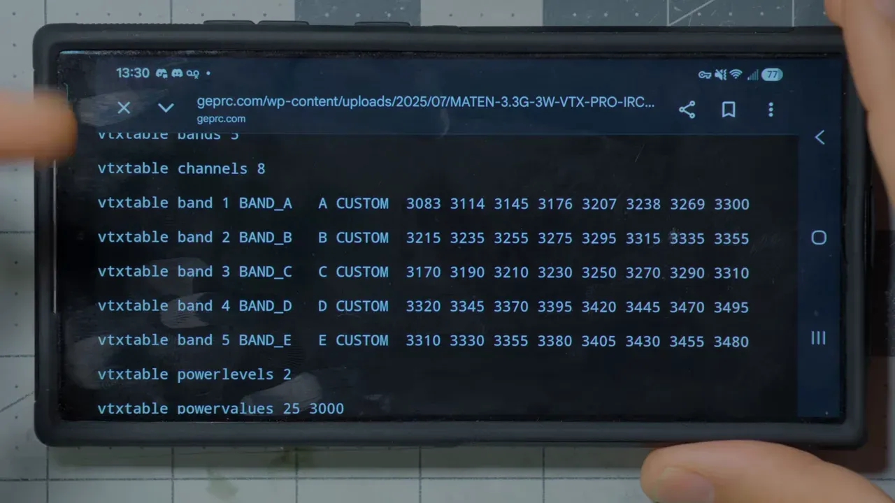 small screen showing a 3.3 GHz channel frequency table with rows of bands and frequencies