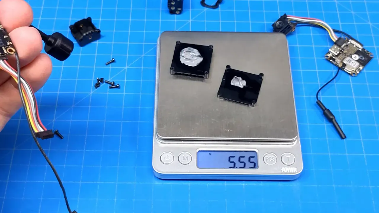 Digital scale displaying 17.18 grams with stripped air unit components