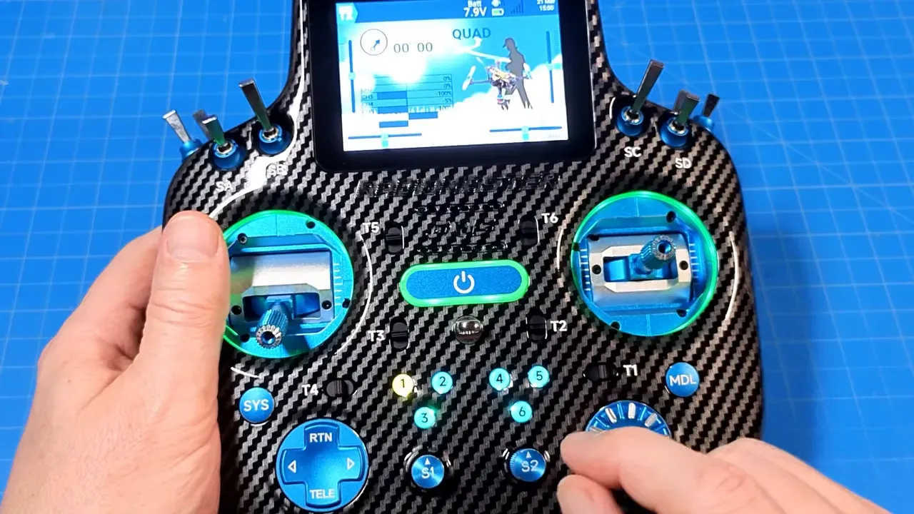 Front of RadioMaster GX15 showing blue gimbals buttons switches and lower rotary dials