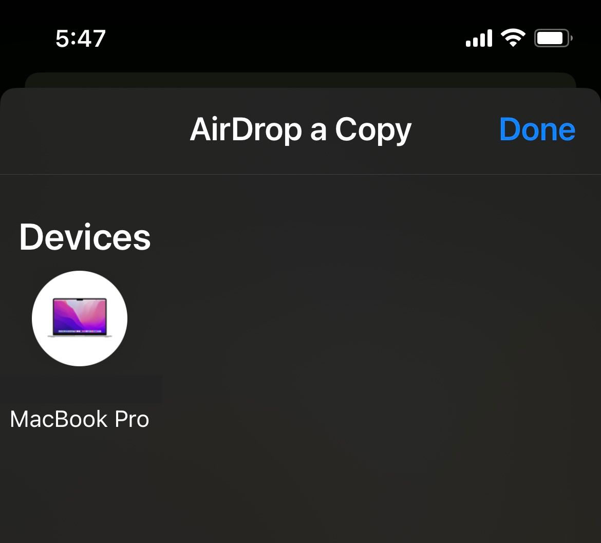 iPhone AirDrop Devices screen showing MacBook Pro