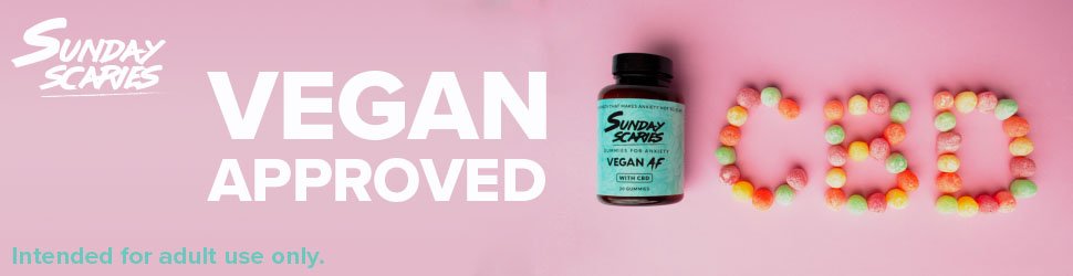 The text vegan approved on a banner with a bottle of gumdrops and gumdrops spelling out CBD.